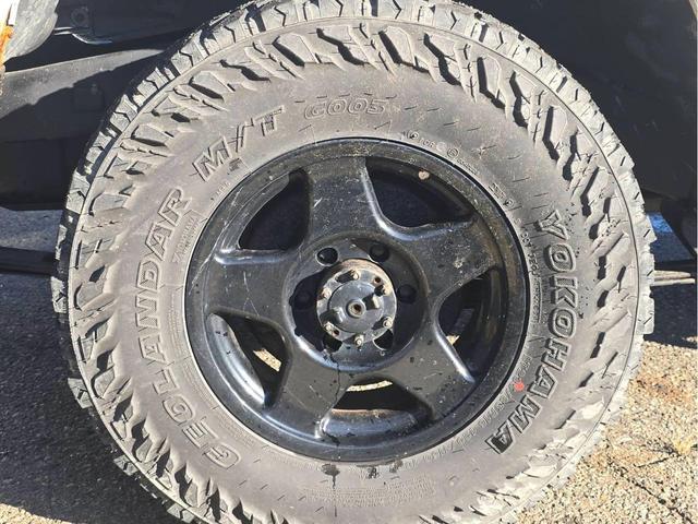 ランドクルーザー７０ ＬＸ　ナロー　４ＷＤ　５速マニュアル　純正ホワイト　パワーウィンドー　ルーフキャリア　ヨコハマジオランダーＭ／Ｔタイヤ　ＥＴＣ　タイミングベルト交換済　車検付き（23枚目）