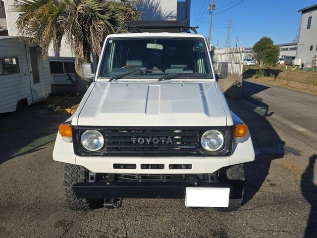 ランドクルーザー７０ ＬＸ　ナロー　４ＷＤ　５速マニュアル　純正ホワイト　パワーウィンドー　ルーフキャリア　ヨコハマジオランダーＭ／Ｔタイヤ　ＥＴＣ　タイミングベルト交換済　車検付き（57枚目）