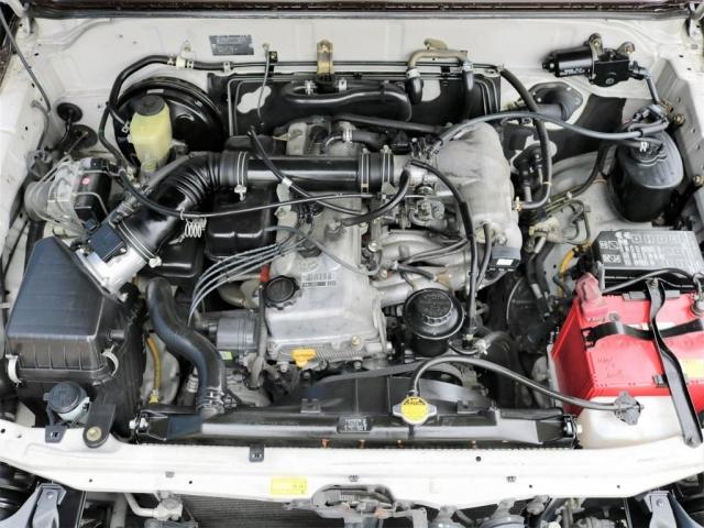 TX 後期型 ガソリン 茶内装 ルーフレール 丸目ヘッドライト オレンジコーナーレンズ TOYOTAグリル LEDテールレンズ DEANカリフォルニア16インチAW グットリッチATタイヤ(15枚目)