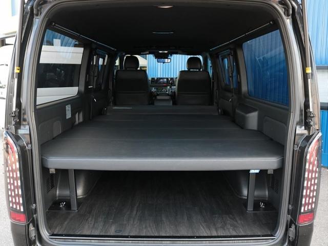 ハイエースバン スーパーGL ダークプライムII ロングボディ 6型ナロー・床張り施工・ベッドキットtypeII・NT1 16インチAW・ナスカータイヤ煌テール・TRDフロントスポイラー・TRDマッドフラップ・Kenwood製フルセグナビ・デジタルインナーミラー(8枚目)