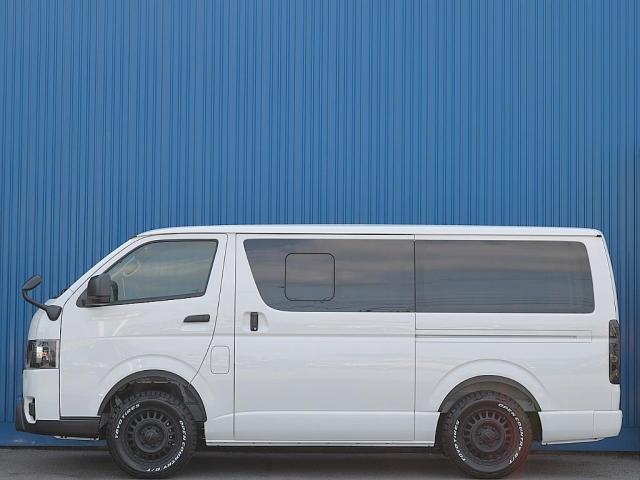 ハイエースバン ロングDX GLパッケージ Type2bヘッドキット・ディーゼルターボ4WD・アルパイン11インチ・インナーブラックヘッドライト・16インチAW・TOYOタイヤ・小窓付き・AC100V電源・黒革調シートカバー・オーバーフェンダー(5枚目)