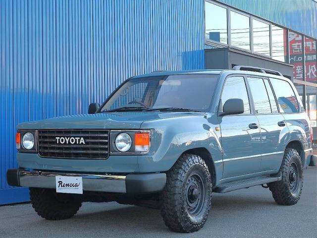 ランドクルーザー１００ ＶＸリミテッド　丸目２灯・アンヴィルグレーペイント・５速ＡＴ・マルチレス・サンルーフ・シートヒーター・ＬＥＤ３色テールランプ・ＤＥＡＮコロラド１６インチＡＷ・ウッドステアリング・クラシックシートカバー（20枚目）
