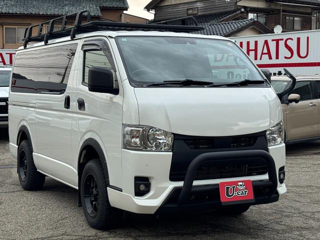 ハイエースバン スーパーGL ダークプライムII 4WD ディーゼル リフトアップ 両側パワースリアドドア バンパーガードオーバーフェンダー チッピング塗装 ベットキット デジタルインナーミラー 全方位モニター プッシュスタート LEDヘッドライト(2枚目)