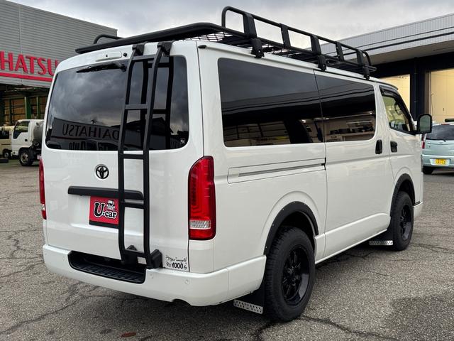 ハイエースバン スーパーGL ダークプライムII 4WD ディーゼル リフトアップ 両側パワースリアドドア バンパーガードオーバーフェンダー チッピング塗装 ベットキット デジタルインナーミラー 全方位モニター プッシュスタート LEDヘッドライト(8枚目)
