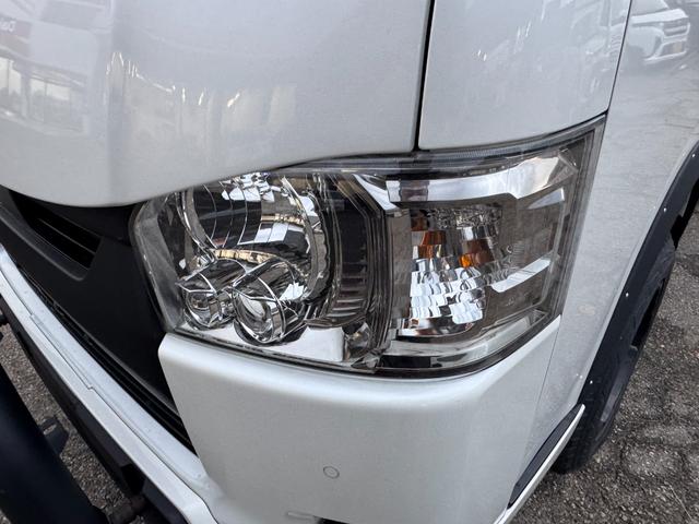 ハイエースバン スーパーGL ダークプライムII 4WD ディーゼル リフトアップ 両側パワースリアドドア バンパーガードオーバーフェンダー チッピング塗装 ベットキット デジタルインナーミラー 全方位モニター プッシュスタート LEDヘッドライト(11枚目)