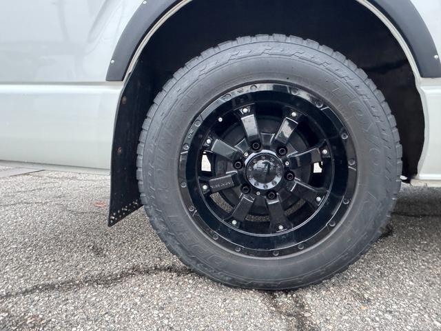 ハイエースバン スーパーGL ダークプライムII 4WD ディーゼル リフトアップ 両側パワースリアドドア バンパーガードオーバーフェンダー チッピング塗装 ベットキット デジタルインナーミラー 全方位モニター プッシュスタート LEDヘッドライト(21枚目)