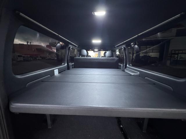 ハイエースバン スーパーGL ダークプライムII 4WD ディーゼル リフトアップ 両側パワースリアドドア バンパーガードオーバーフェンダー チッピング塗装 ベットキット デジタルインナーミラー 全方位モニター プッシュスタート LEDヘッドライト(43枚目)