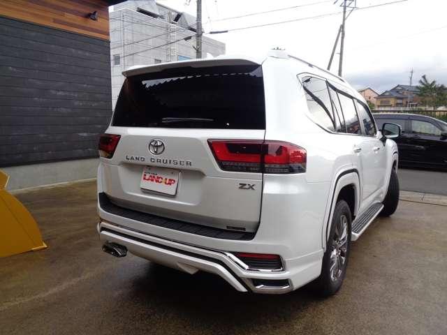 ランドクルーザー ZX モデリスタエアロ GRグリル リアエンターテイメント 全周囲カメラ アルパインデジタルインナーミラー シートヒーターエアコン サンルーフ 禁煙車 ワンオーナー 100V電源 パワーシート 3列シート(6枚目)