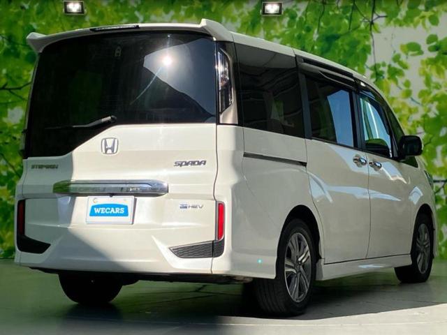 ステップワゴンスパーダ eHEVスパーダG・ホンダセンシング 新品タイヤ/保証書/純正 9インチ SDナビ/ホンダセンシング/両側電動スライドドア/車線逸脱防止支援システム/パーキングアシスト バックガイド/ヘッドランプ LED 衝突被害軽減システム DVD再生(3枚目)