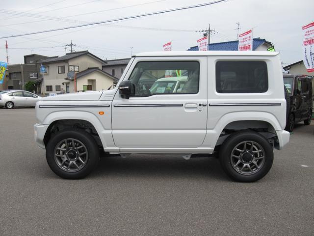 XC セーフティサポート AT車 届出済未使用車 GルックLEDデイライト付グリル 同色バンパー オーディオレス 横滑防止装置 シートヒーター クルコン スペアタイヤカバー ダウンヒルアシスト オートAC(8枚目)