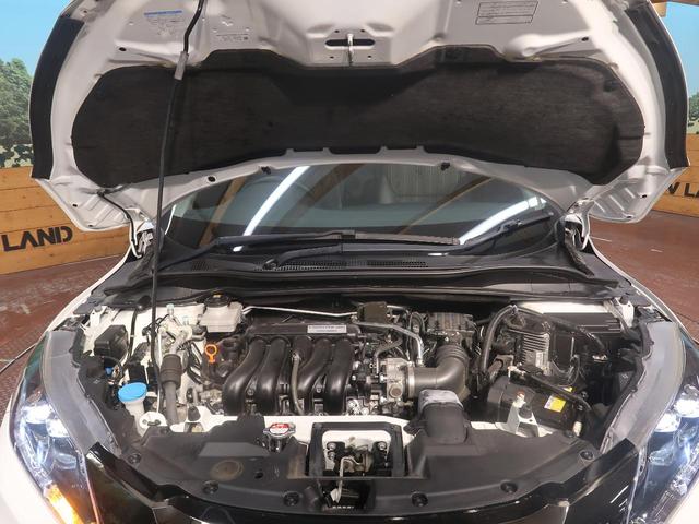 ハイブリッドZ・ホンダセンシング 禁煙車 純正ナビ レーダークルーズ 衝突軽減 バックカメラ シートヒーター フルセグ ETC ルーフレール LEDヘッド LEDフォグ オートライト オートブレーキホールド パドルシフト スマートキー(18枚目)