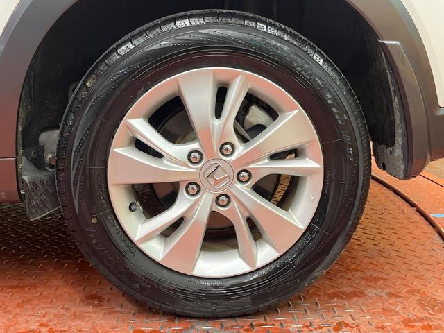 ヴェゼル ハイブリッドX 純正SDナビ シティブレーキアクティブシステム バックカメラ 禁煙車 スマートキー LEDヘッド クルコン オートライト オートエアコン 純正16インチアルミ Bluetooth CD DVD再生(28枚目)