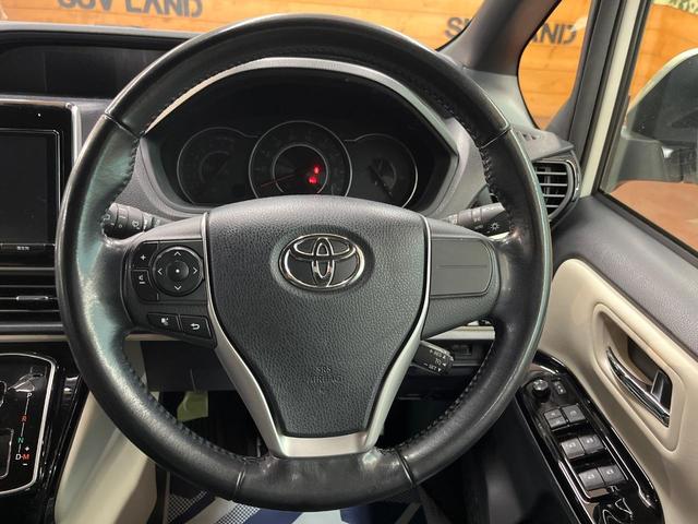 ノア Si ダブルバイビー 4WD 純正9型ナビ フリップダウンモニター バックカメラ 両側電動ドア ドライブレコーダー ETC クルーズコントロール LEDヘッド オートライト オートハイビーム 革巻きステアリング(12枚目)