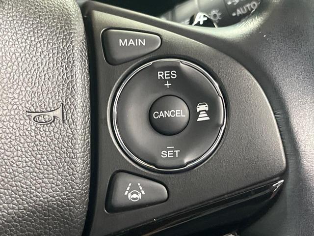 ヴェゼル ハイブリッドＺ・ホンダセンシング　４ＷＤ　純正ナビ　バックカメラ　寒冷地仕様　ホンダセンシング　レーダークルーズ　禁煙車　ハーフレザーシート　シートヒーター　コーナーセンサー　ＬＥＤヘッド　ビルトインＥＴＣ　純正１７インチアルミ（6枚目）