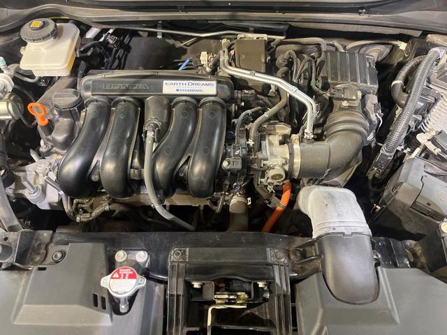 ヴェゼル ハイブリッドＺ・ホンダセンシング　４ＷＤ　純正ナビ　バックカメラ　寒冷地仕様　ホンダセンシング　レーダークルーズ　禁煙車　ハーフレザーシート　シートヒーター　コーナーセンサー　ＬＥＤヘッド　ビルトインＥＴＣ　純正１７インチアルミ（18枚目）