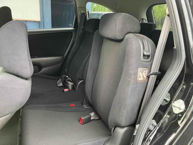 ストリーム Ｘ　ＥＴＣ　バックカメラ　ナビ　ＴＶ　キーレスエントリー　３列シート　ＡＴ　アルミホイール　ＣＤ　衝突安全ボディ　ＡＢＳ　エアコン　パワーステアリング　パワーウィンドウ（13枚目）