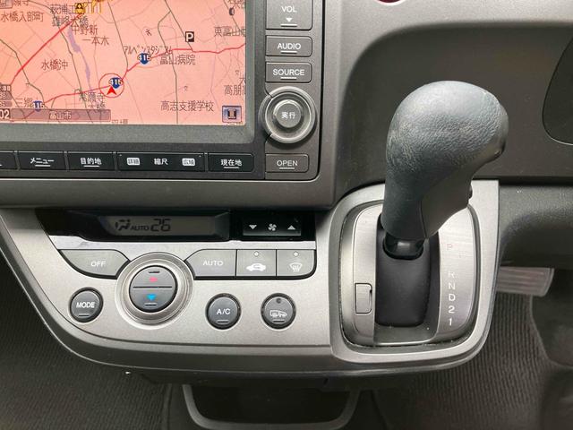 ストリーム Ｘ　ＥＴＣ　バックカメラ　ナビ　ＴＶ　キーレスエントリー　３列シート　ＡＴ　アルミホイール　ＣＤ　衝突安全ボディ　ＡＢＳ　エアコン　パワーステアリング　パワーウィンドウ（21枚目）