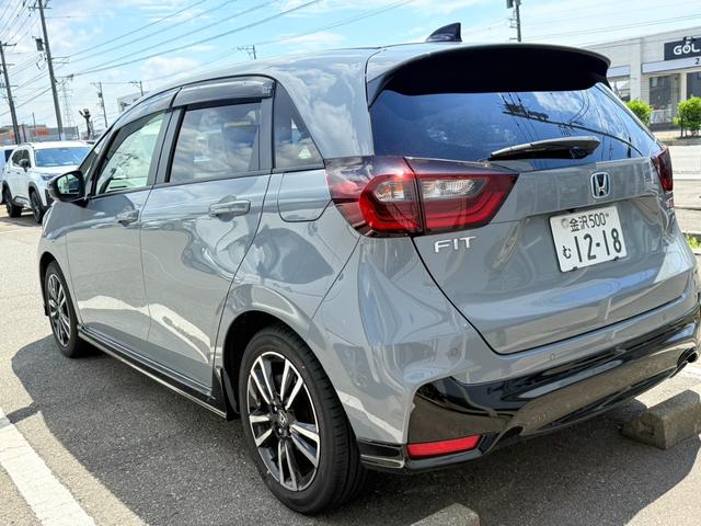 フィット ｅ：ＨＥＶＲＳ　当社試乗車　純正ナビ　ＥＴＣ（9枚目）