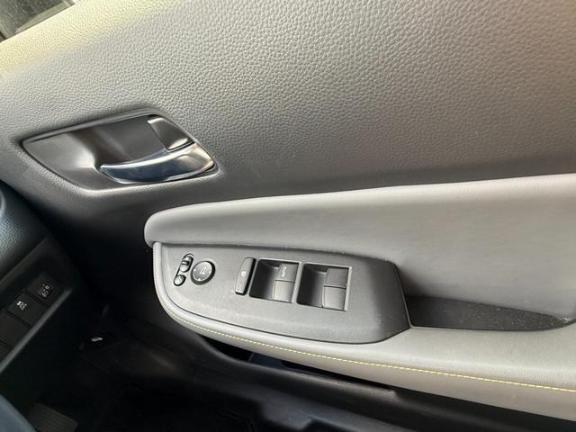 フィット ｅ：ＨＥＶＲＳ　当社試乗車　純正ナビ　ＥＴＣ（24枚目）