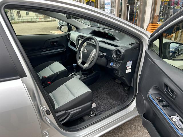 アクア Ｓ【愛媛仕入】【２０２４年製グッドイヤータイヤ】【禁煙車】　【純正ＳＤナビ／ワンセグ／ＢＴ接続】【ＬＥＤオートライト＆フォグ】【ヘッドライトウォッシャー】【ＥＴＣ】【オートエアコン】【スマートキー＆プッシュスタート】盗難防止装置　電格ミラー　ミラーウインカー（18枚目）