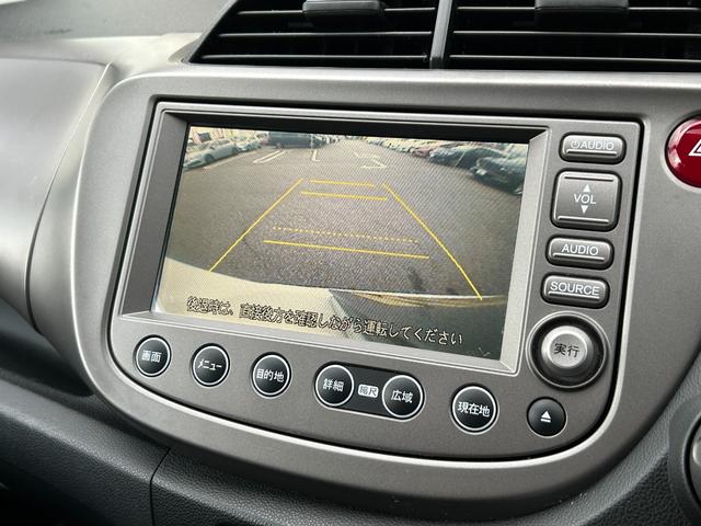 フィット G【タイミングチェーン】【2023年製ダンロップタイヤ】禁煙 【純正HDDナビ/ワンセグ/CD&DVD再生/バックカメラ】【ETC】【キーレス】【電格ミラー】【ミラーウインカー】【スペアキー有】(4枚目)