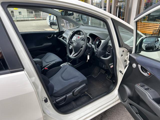 フィット G【タイミングチェーン】【2023年製ダンロップタイヤ】禁煙 【純正HDDナビ/ワンセグ/CD&DVD再生/バックカメラ】【ETC】【キーレス】【電格ミラー】【ミラーウインカー】【スペアキー有】(18枚目)