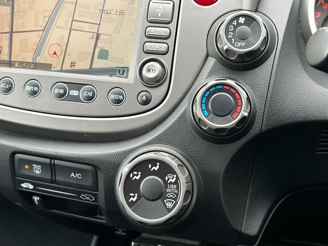 フィット G【タイミングチェーン】【2023年製ダンロップタイヤ】禁煙 【純正HDDナビ/ワンセグ/CD&DVD再生/バックカメラ】【ETC】【キーレス】【電格ミラー】【ミラーウインカー】【スペアキー有】(31枚目)