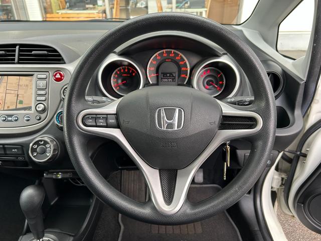 フィット G【タイミングチェーン】【2023年製ダンロップタイヤ】禁煙 【純正HDDナビ/ワンセグ/CD&DVD再生/バックカメラ】【ETC】【キーレス】【電格ミラー】【ミラーウインカー】【スペアキー有】(35枚目)