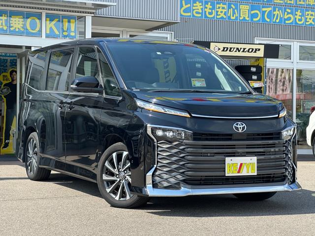 ヴォクシー Ｓ－Ｚ【衝突軽減＆車線逸脱警報】【１４型後席モニター】禁煙車　【純正１０型ナビ／地デジ／ＢＴ再生／全方位カメラ】【追従クルコン】【両側電動ドア】ヒーター付ハーフレザー　ＥＴＣ２．０　デジタルインナーミラー　パークアシスト　ＢＳＭ　電動パーキング　ワイパー熱線（15枚目）