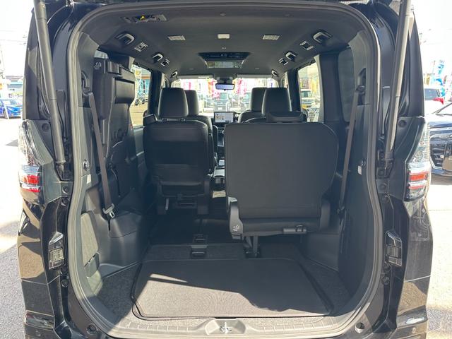 ヴォクシー Ｓ－Ｚ【衝突軽減＆車線逸脱警報】【１４型後席モニター】禁煙車　【純正１０型ナビ／地デジ／ＢＴ再生／全方位カメラ】【追従クルコン】【両側電動ドア】ヒーター付ハーフレザー　ＥＴＣ２．０　デジタルインナーミラー　パークアシスト　ＢＳＭ　電動パーキング　ワイパー熱線（32枚目）