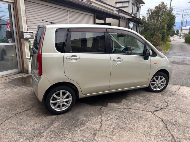 ムーヴ X スマートキー プッシュスタート アイドリングストップ ワンセグSDナビ DVD CD ラジオ バックカメラ 純正14インチアルミ 革巻きハンドル ベンチシート アームレスト 電動格納ミラー(13枚目)