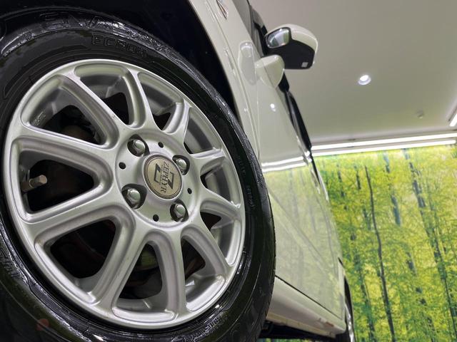 Ｎ－ＢＯＸ Ｇ・Ｌパッケージ　電動スライドドア　純正ＳＤナビ　バックカメラ　禁煙車　スマートキー　オートエアコン　ＤＶＤ再生　地デジ　ＣＤ再生　ステアリングスイッチ　横滑り防止装置　盗難防止装置　トラクションコントロール（14枚目）
