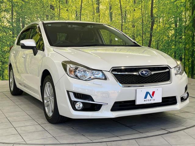 インプレッサスポーツ 2.0iアイサイト 4WD 純正SDナビ バックカメラ 衝突被害軽減システム レーダークルーズ 禁煙車 スマートキー HIDヘッド ETC オートライト デュアルエアコン 純正17インチアルミ Bluetooth CD(16枚目)