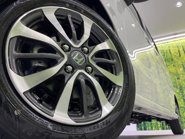 N-BOXカスタム ベースグレード 4WD ホンダセンシング パワースライドドア 届出済未使用車 アダプティブクルーズ LEDヘッドライト クリアランスソナー サイドエアバッグ カーテンエアバッグ オートライト スマートキー(13枚目)