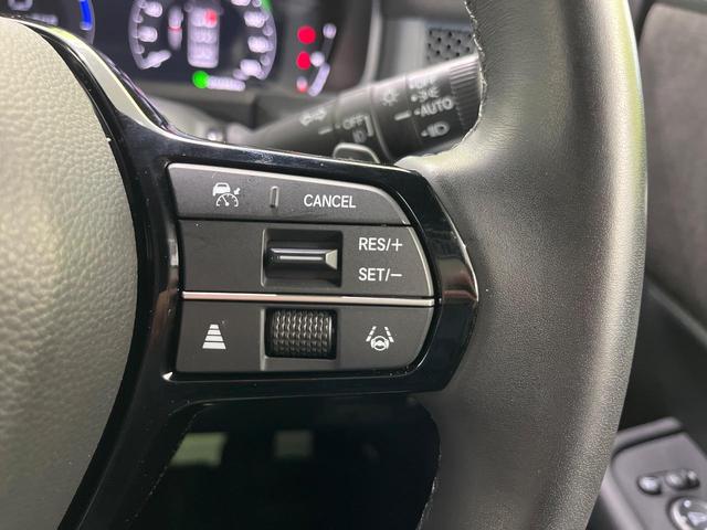 ステップワゴン ｅ：ＨＥＶスパーダ　プレミアムライン　ホンダセンシング　両側パワースライドドア　純正１１．４インチ純正ナビ　全周囲カメラ　Ｂｌｕｅｔｏｏｔｈ再生　ドライブレコーダー　ＥＴＣ　デュアルオートエアコン　クリアランスソナー　禁煙車　ＬＥＤヘッド（25枚目）