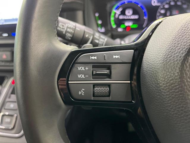 ステップワゴン ｅ：ＨＥＶスパーダ　プレミアムライン　ホンダセンシング　両側パワースライドドア　純正１１．４インチ純正ナビ　全周囲カメラ　Ｂｌｕｅｔｏｏｔｈ再生　ドライブレコーダー　ＥＴＣ　デュアルオートエアコン　クリアランスソナー　禁煙車　ＬＥＤヘッド（26枚目）