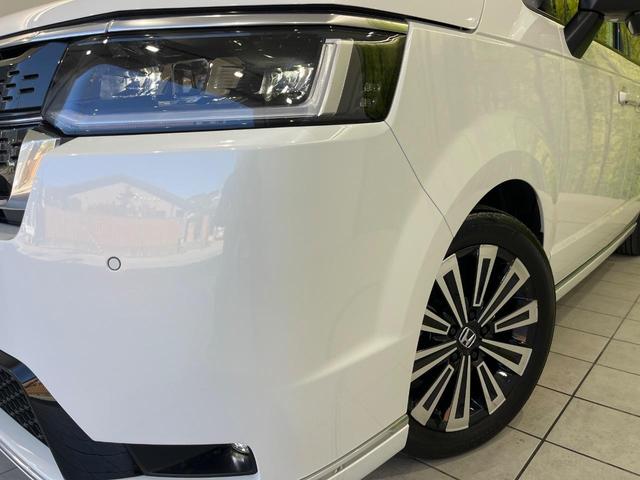 ステップワゴン ｅ：ＨＥＶスパーダ　プレミアムライン　ホンダセンシング　両側パワースライドドア　純正１１．４インチ純正ナビ　全周囲カメラ　Ｂｌｕｅｔｏｏｔｈ再生　ドライブレコーダー　ＥＴＣ　デュアルオートエアコン　クリアランスソナー　禁煙車　ＬＥＤヘッド（51枚目）