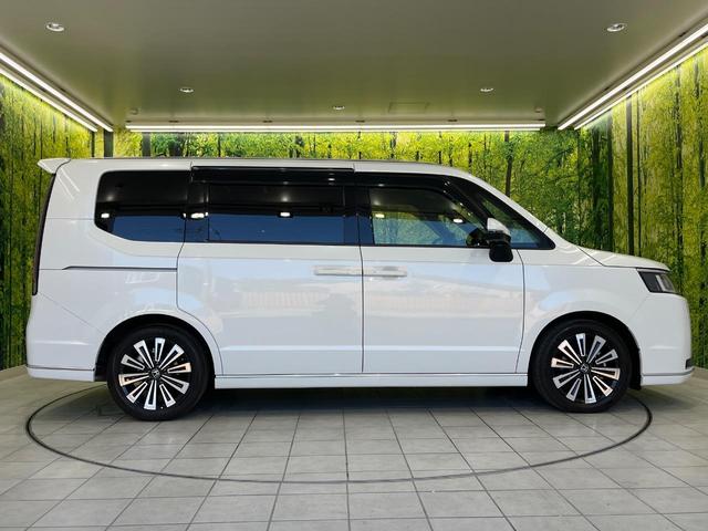 ステップワゴン ｅ：ＨＥＶスパーダ　プレミアムライン　ホンダセンシング　両側パワースライドドア　純正１１．４インチ純正ナビ　全周囲カメラ　Ｂｌｕｅｔｏｏｔｈ再生　ドライブレコーダー　ＥＴＣ　デュアルオートエアコン　クリアランスソナー　禁煙車　ＬＥＤヘッド（62枚目）