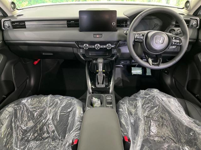 ヴェゼル ｅ：ＨＥＶ　Ｚ　登録済未使用車　全周囲カメラ　衝突被害軽減システム　レーダークルーズ　電動リアゲート　ハーフレザーシート　コーナーセンサー　スマートキー　ＬＥＤヘッド　ＥＴＣ２．０　車線逸脱警報　オートライト（2枚目）