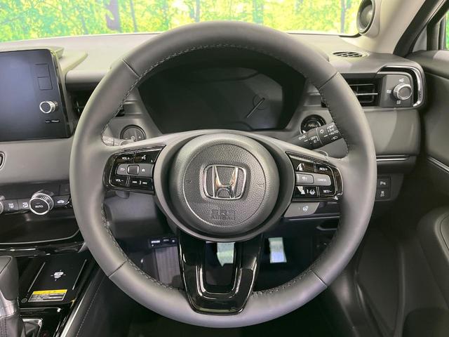 ヴェゼル ｅ：ＨＥＶ　Ｚ　登録済未使用車　全周囲カメラ　衝突被害軽減システム　レーダークルーズ　電動リアゲート　ハーフレザーシート　コーナーセンサー　スマートキー　ＬＥＤヘッド　ＥＴＣ２．０　車線逸脱警報　オートライト（13枚目）