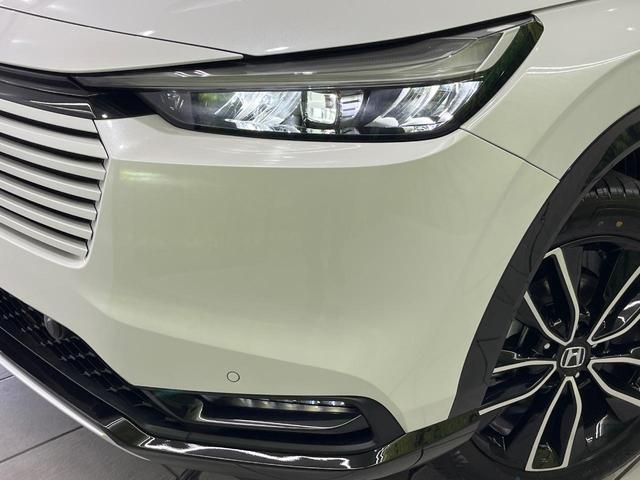 ヴェゼル ｅ：ＨＥＶ　Ｚ　登録済未使用車　全周囲カメラ　衝突被害軽減システム　レーダークルーズ　電動リアゲート　ハーフレザーシート　コーナーセンサー　スマートキー　ＬＥＤヘッド　ＥＴＣ２．０　車線逸脱警報　オートライト（14枚目）