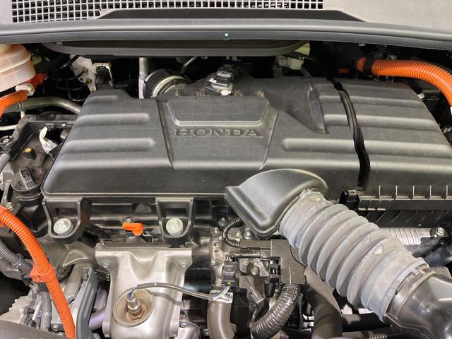 ステップワゴン ｅ：ＨＥＶスパーダ　ホンダセンシング　１０．１インチフリップダウンモニター　両側パワースライドドア　純正９インチナビ　Ｂｌｕｅｔｏｏｔｈ再生　ドライブレコーダー　バックカメラ　フルセグＴＶ　ＥＴＣ　禁煙車（19枚目）