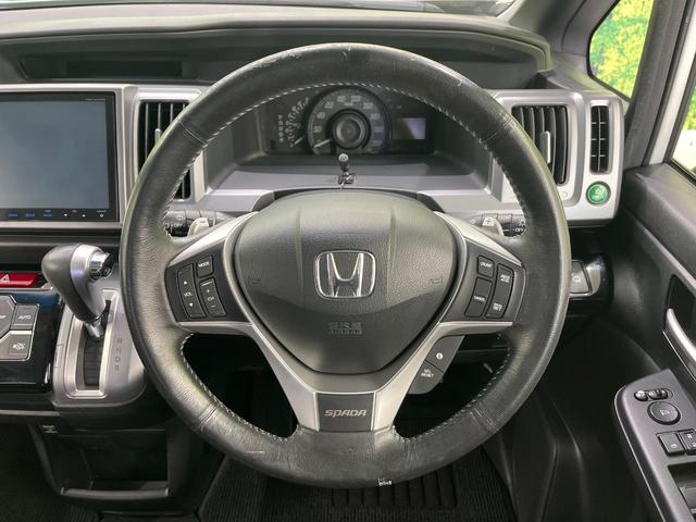 ステップワゴンスパーダ Ｚ　クールスピリット　４ＷＤ　両側パワースライドドア　純正１１インチフリップダウンモニター　純正９インチナビ　Ｂｌｕｅｔｏｏｔｈ再生　前後ドライブレコーダー　バックカメラ　フルセグＴＶ　８人乗り　禁煙車　クルコン（12枚目）