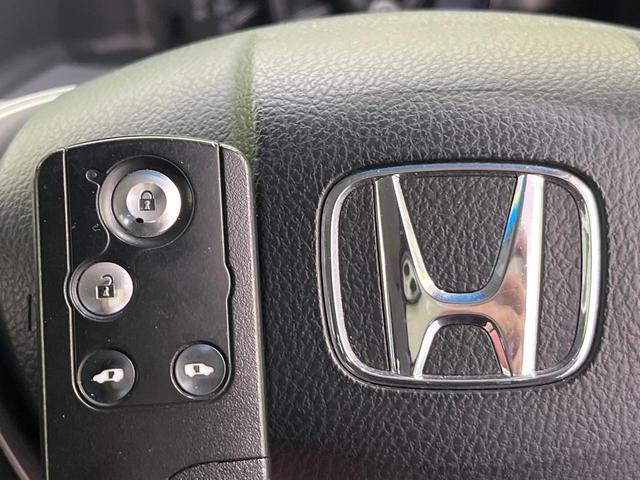 ステップワゴンスパーダ Ｚ　クールスピリット　４ＷＤ　両側パワースライドドア　純正１１インチフリップダウンモニター　純正９インチナビ　Ｂｌｕｅｔｏｏｔｈ再生　前後ドライブレコーダー　バックカメラ　フルセグＴＶ　８人乗り　禁煙車　クルコン（36枚目）