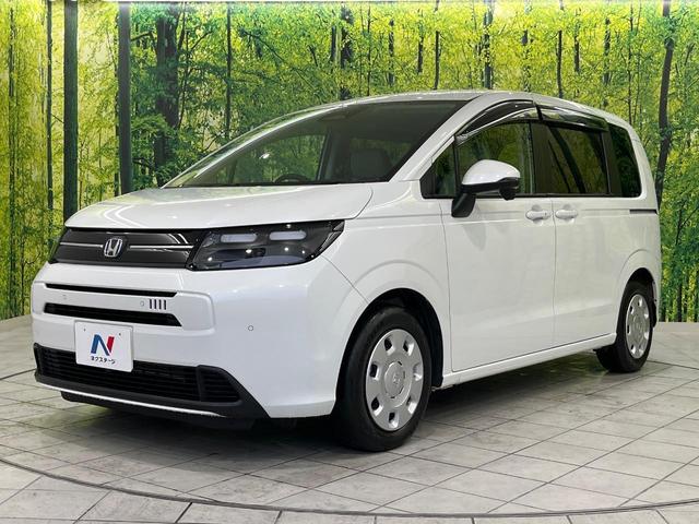 フリード エアー　両側電動ドア　純正ディスプレイオーディオ　バックカメラ　衝突被害軽減システム　レーダークルーズ　禁煙車　コーナーセンサー　スマートキー　ＬＥＤヘッド　オートハイビーム　車線逸脱警報　オートライト（56枚目）