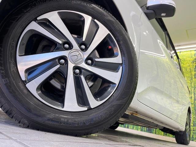 フリード Ｇ・ホンダセンシング　衝突軽減ブレーキ　両側パワースライドドア　Ｂｌｕｅｔｏｏｔｈ再生　バックカメラ　フルセグＴＶ　ＥＴＣ　ＬＥＤヘッドライト　禁煙車　純正１５インチアルミホイール　６人乗り　レーンアシスト　スマートキー（14枚目）