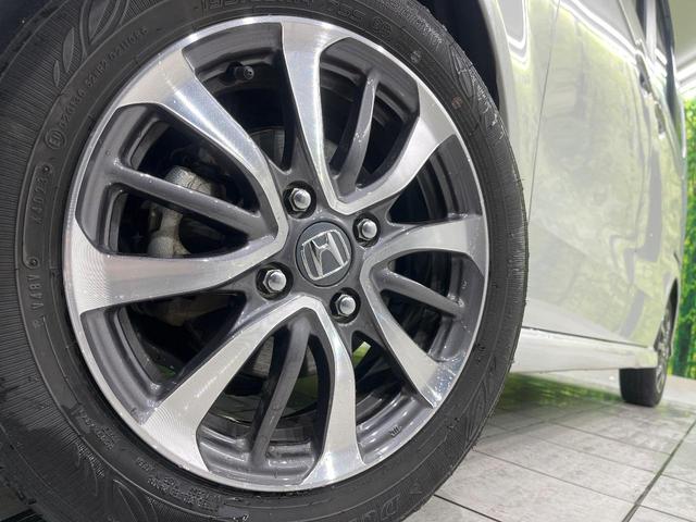 Ｎ－ＢＯＸカスタム ベースグレード　両側パワースライドドア　ホンダセンシング　純正８インチナビ　Ｂｌｕｅｔｏｏｔｈ再生　ドライブレコーダー　バックカメラ　フルセグＴＶ　ＥＴＣ　禁煙車　アダプティブクルーズ　ＬＥＦＤヘッド　フロントフォグ（14枚目）