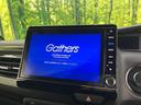 N-BOXカスタム G・EXターボホンダセンシング 4WD 両側電動ドア 純正SDナビ バックカメラ 衝突被害軽減システム ハーフレザーシート ドラレコ コーナーセンサー スマートキー LEDヘッド ビルトインETC 純正15インチアルミ 中古車画像_3