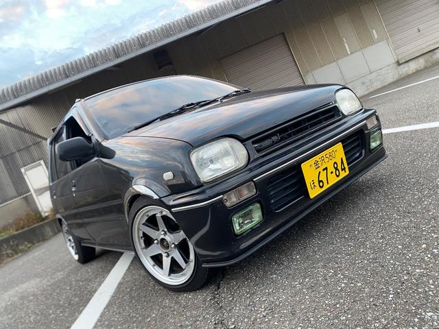 ミラ Ｊ－タイプＱ　５速マニュアル　社外ショック＆スプリング　ワンオフマフラー　アヴァンツアート内装換装　フェンダートリム　社外アルミ　Ｂｌｕｅｔｏｏｔｈ対応オーディオ　車検整備付（3枚目）