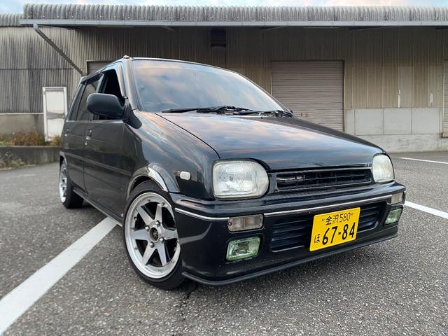 ミラ Ｊ－タイプＱ　５速マニュアル　社外ショック＆スプリング　ワンオフマフラー　アヴァンツアート内装換装　フェンダートリム　社外アルミ　Ｂｌｕｅｔｏｏｔｈ対応オーディオ　車検整備付（4枚目）